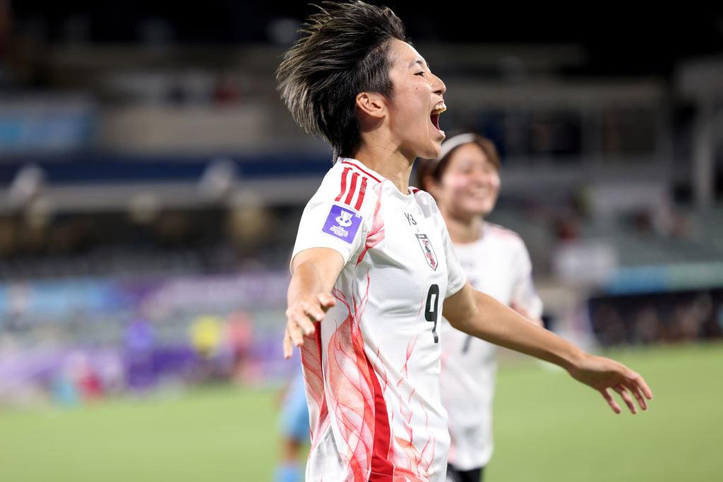 Japan's Riko Ueki celebrates after scoring a goal during the Women's Asian Cup soccer match between Japan and India in Perth, Australia, Saturday, March 7, 2026. (Colin Murtyt/AAPImage via AP)