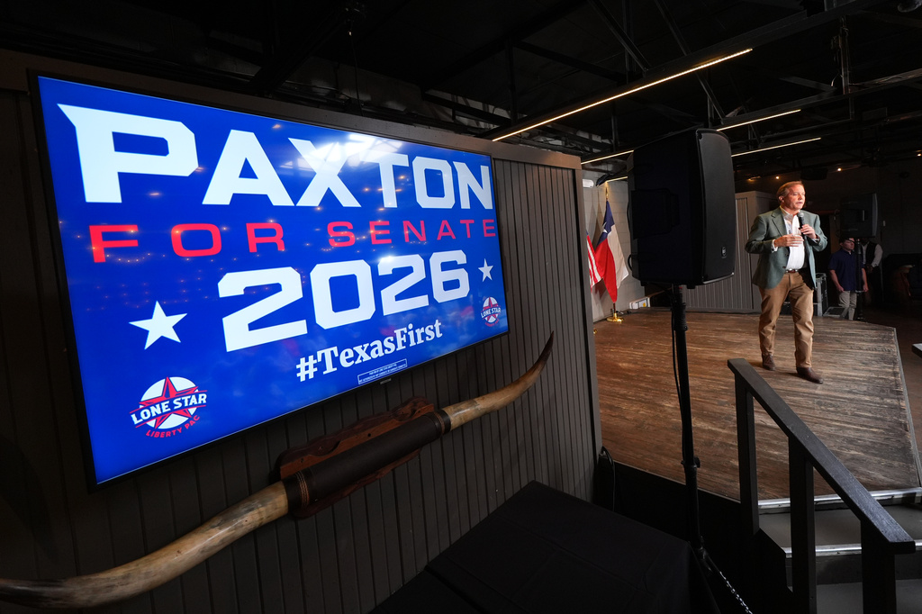 Texas Attorney General Ken Paxton, a Republican candidate for the U.S. Senate, speaks to supporters while campaigning for his primary runoff race Monday, May 18, 2026, in Dallas. (AP Photo/Julio Cortez)