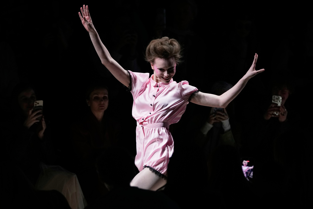 A model wears a creation by Russian brand Masterpeace on a runway at the Moscow Fashion Week in Moscow, Saturday, March 14, 2026. (AP Photo/Pavel Bednyakov)