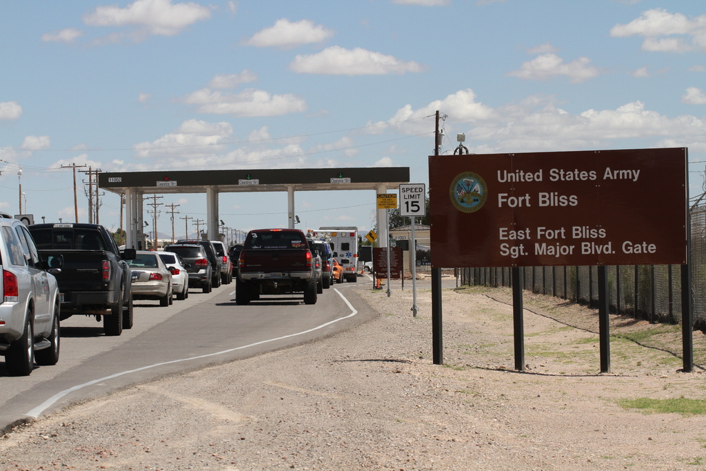 FILE - Cars wait to enter Fort Bliss in El Paso, Texas, Sept. 9, 2014. (AP Photo/Juan Carlos Llorca, File)