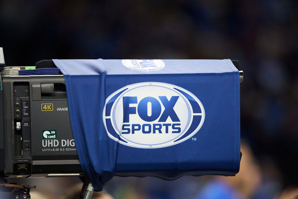 FILE - Fox Sports logo on a camera during an NFL football game between the Tennessee Titans and Detroit Lions in Detroit, Oct. 27, 2024. (AP Photo/Rick Osentoski, File)