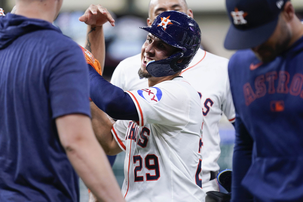 Houston Astros' Ramon Urias (29) celebrates after hitting the game-winning ground out against the Baltimore Orioles during the twelfth inning of a baseball game, Saturday, Aug. 16, 2025, in Houston. (AP Photo/Eric Christian Smith)