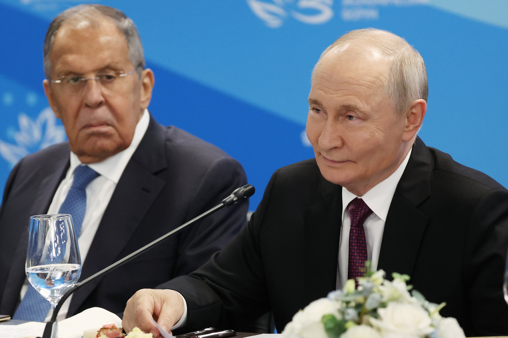 Russian President Vladimir Putin, right, and Russian Foreign Minister Sergey Lavrov, attend the talks with Indonesian President Prabowo Subianto on the sidelines of the Eastern Economic Forum in Vladivostok, Russia, Thursday, Sept. 3, 2026. (Vyacheslav Prokofyev/Sputnik, Kremlin Pool Photo via AP)