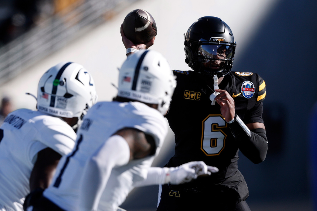 Appalachian State quarterback Matthew Wilson (6) throws a pass during the first half of the Birmingham Bowl NCAA college football game against Georgia Southern, Monday, Dec. 29, 2025, in Birmingham. (AP Photo/Butch Dill)