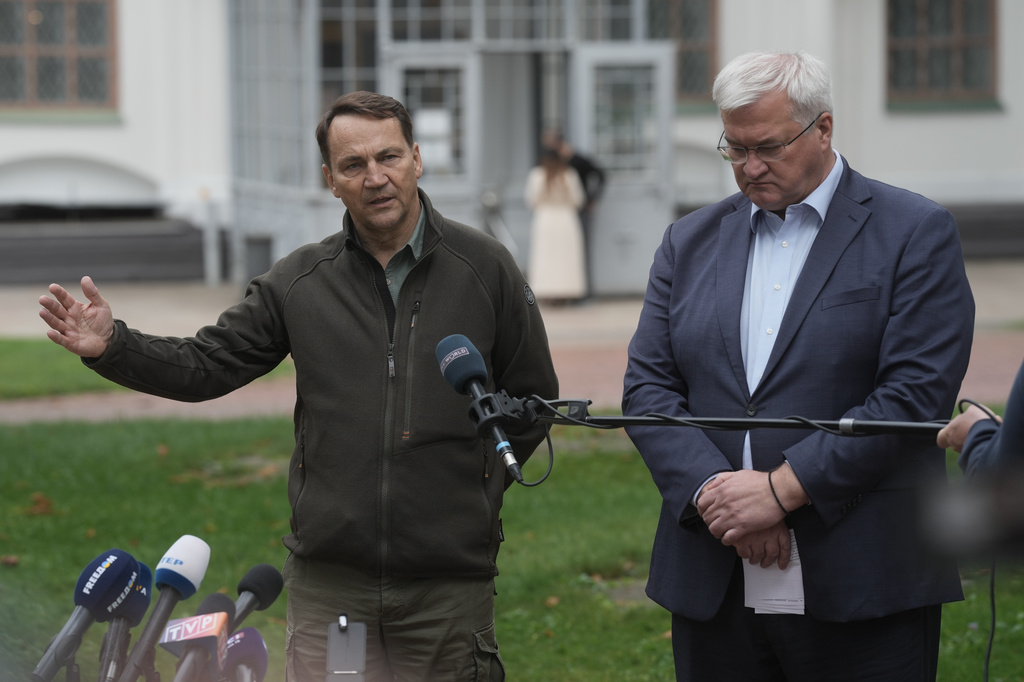 Poland's Foreign Minister Radoslaw Sikorski, left, speaks during a joint news conference with Ukrainian Foreign Minister Andrii Sybiha in Kyiv, Ukraine, Sunday, Sept. 13, 2026. (AP Photo)