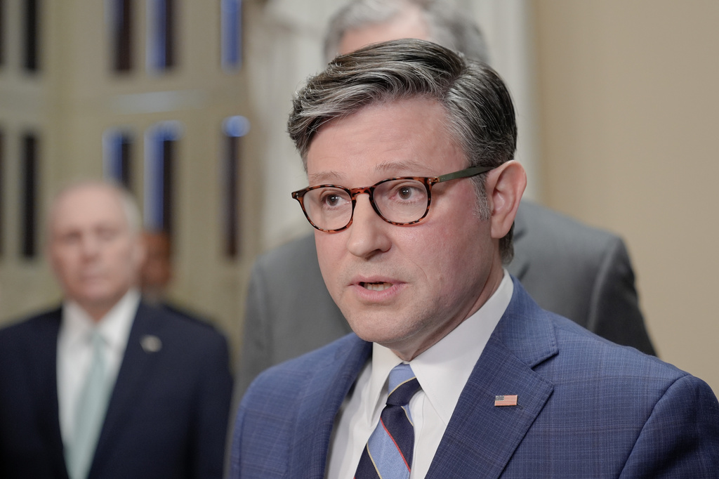 Speaker of the House Mike Johnson, R-La., speaks as House Majority Leader Steve Scalise R-La., left, listens during a news conference on Capitol Hill, Friday, May 15, 2026, in Washington. (AP Photo/Mariam Zuhaib)