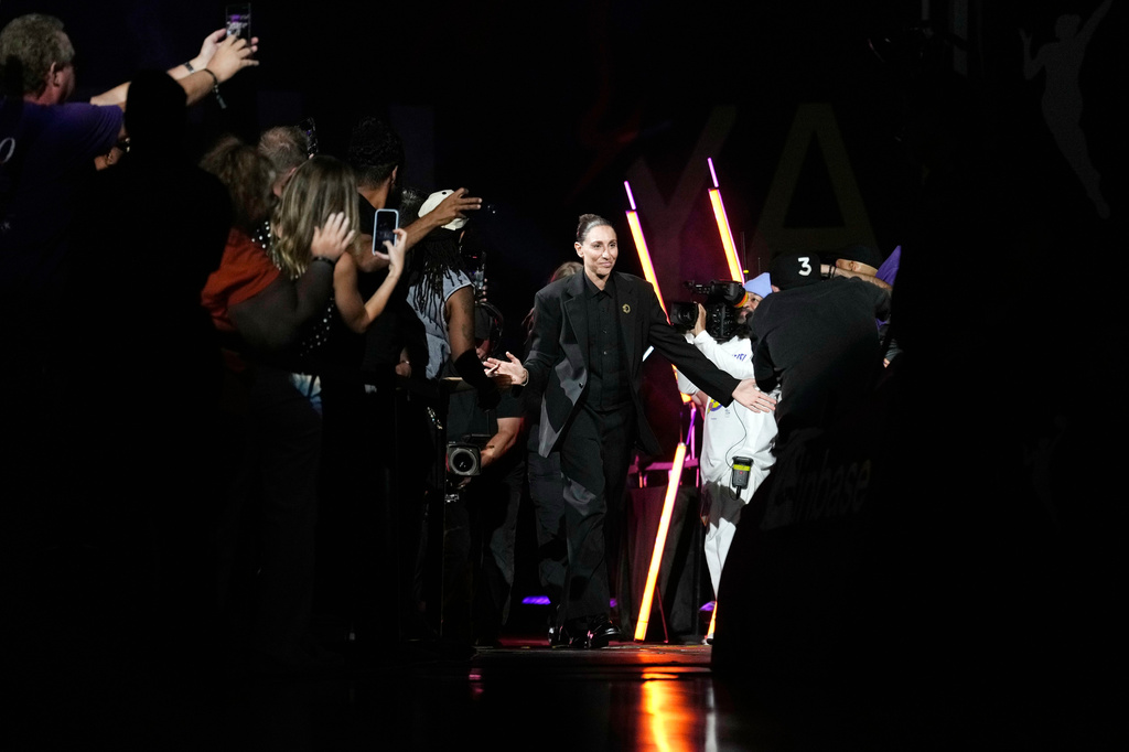Retired WNBA Phoenix Mercury basketball player Diana Taurasi is honored during a halftime Ring of Honor ceremony Sunday, Aug. 16, 2026, in Phoenix. (AP Photo/Ross D. Franklin)