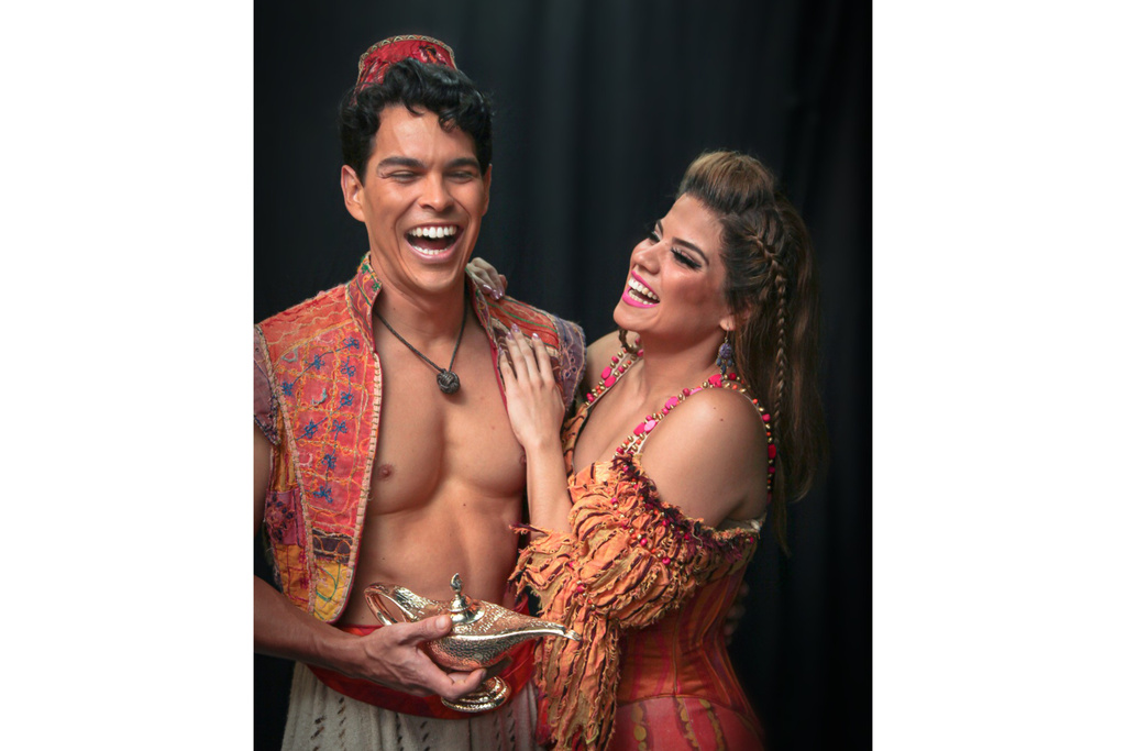 This 2022 image shows actors Rodney Ingram, left, and his now wife Sonia Monroy during rehearsals for “Aladdin”at the Telcel Theatre in Mexico City. (Rodrigo Negrini via AP)