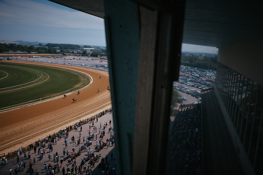 Jockeys ride their horses after a race at Aqueduct Racetrack on closing day in the Queens borough of New York, Sunday, June 28, 2026. (AP Photo/Andres Kudacki)