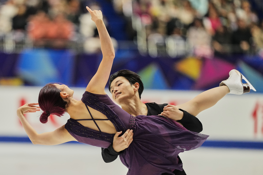 Maia Shibutani and Alex Shibutani, of the U.S., perform during the ice dance free dance program in the ISU Grand Prix of Figure Skating - NHK Trophy in Kadoma, east of Osaka, western Japan, Saturday, Nov. 8, 2025. (AP Photo/Hiro Komae)