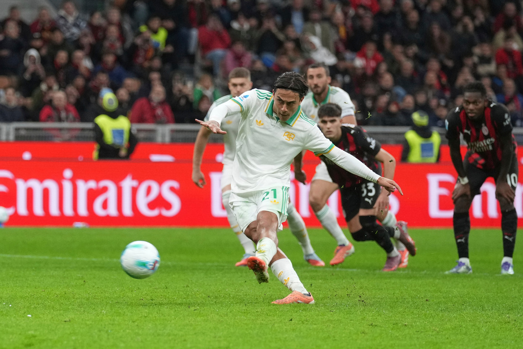 Roma's Paulo Dybala misses to score the penalty during the Serie A soccer match between AC Milan and Roma in Milan, Italy, Sunday, Nov. 2, 2025. (AP Photo/Antonio Calanni)