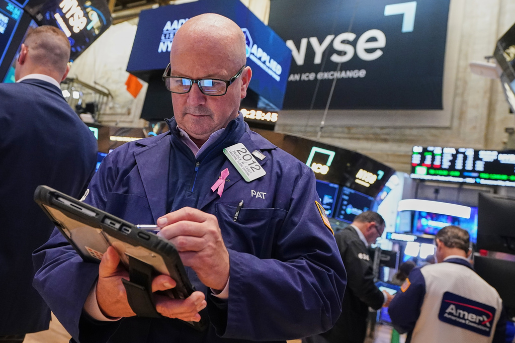 Trader Patrick Casey works on the floor of the New York Stock Exchange, Wednesday, June 3, 2026. (AP Photo/Richard Drew)