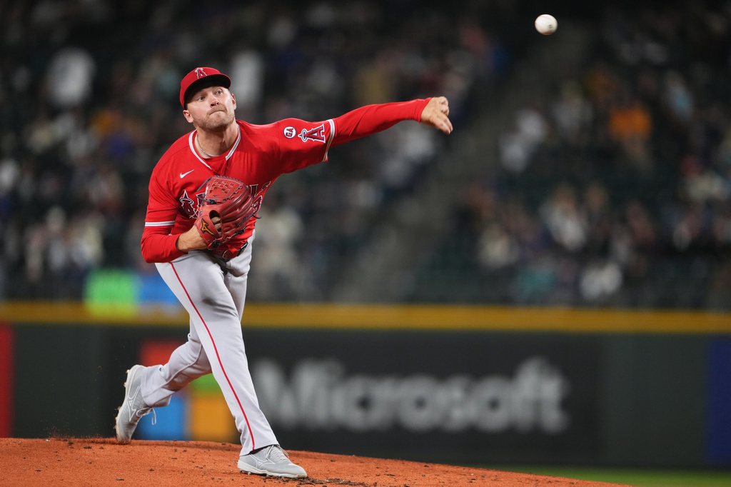 Los Angeles Angels starting pitcher Reid Detmers throws against the Seattle Mariners during the first inning of a baseball game, Friday, Sept. 25, 2026, in Seattle. (AP Photo/Lindsey Wasson)