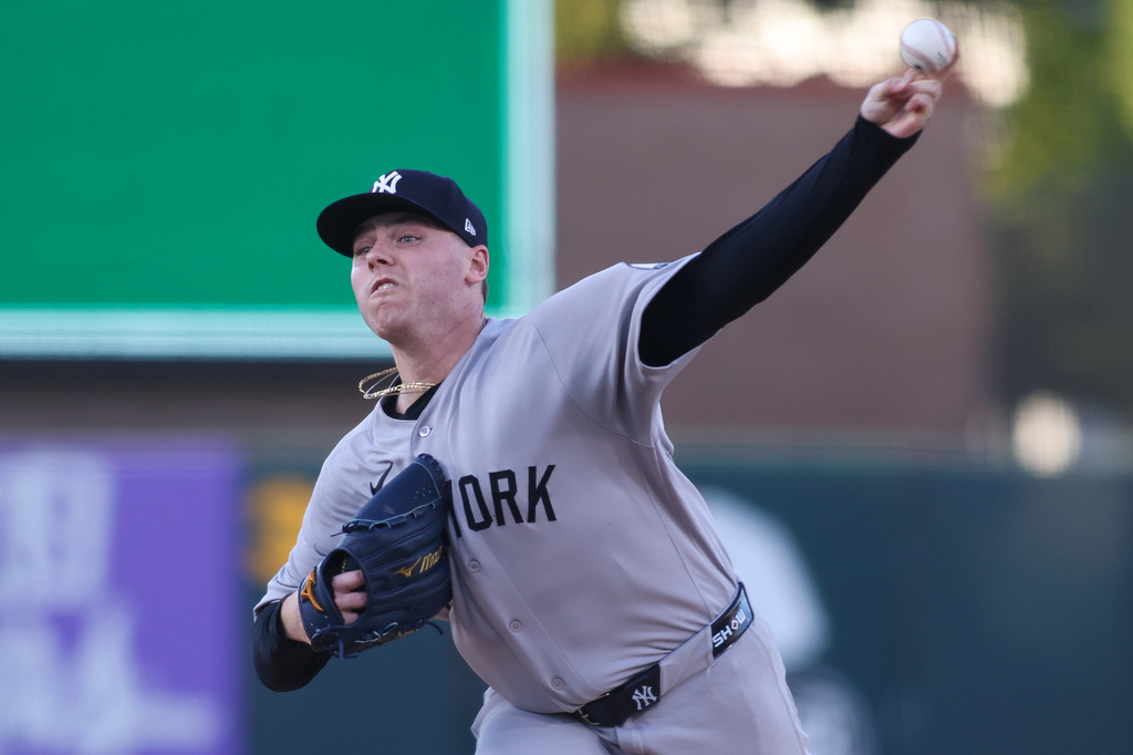 New York Yankees pitcher Ryan Weathers throws to an Athletics batter during the first inning of a baseball game Saturday, May 30, 2026, in West Sacramento, Calif. (AP Photo/Scott Marshall)