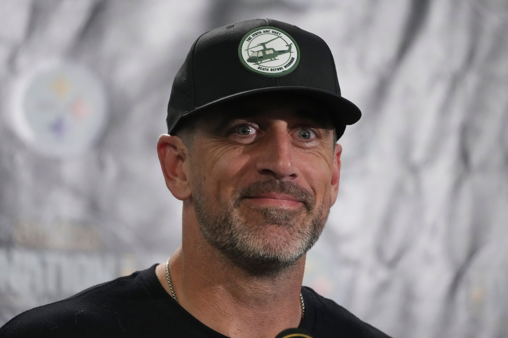 Pittsburgh Steelers quarterback Aaron Rodgers (8) speaks during a press conference following an NFL football game against the Indianapolis Colts in Pittsburgh, Sunday, Oct. 11, 2026. (AP Photo/Gene J. Puskar)