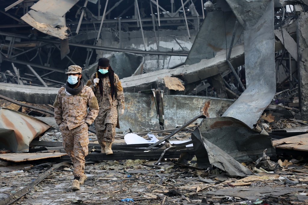 Taliban rescue workers inspect the site of a late-Monday airstrike at a drug rehabilitation hospital in Kabul, Afghanistan, Tuesday, March 17, 2026. (AP Photo/Siddiqullah Alizai)