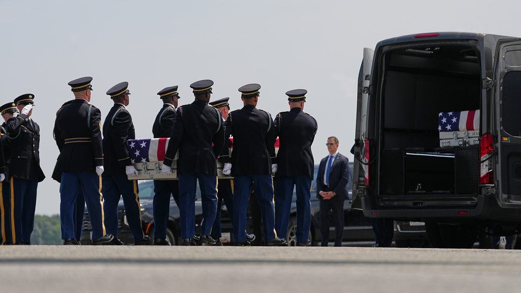 A U.S. Army carry team moves a transfer case containing the remains of Pvt. Isabella Gonzales of Carrollton, Texas, Wednesday, July 22, 2026, at Dover Air Force Base, Del. (AP Photo/Matt Rourke)