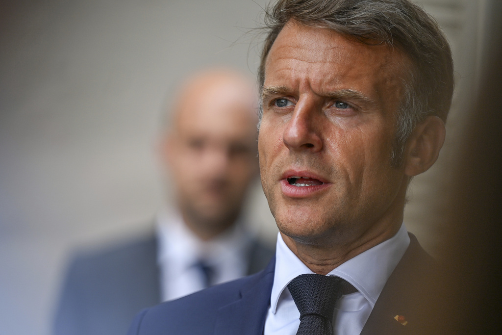 French President Emmanuel Macron speaks during a statement following a video conference on Ukraine at the Fort de Bregancon in Bormes-les-Mimosas, southern France, Wednesday Aug.13, 2025. (Philippe Magoni, Pool via AP)