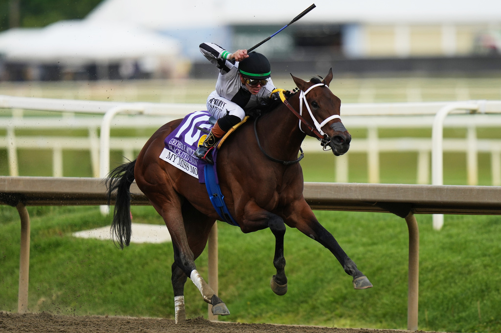 Tyler Gaffalione, atop My Miss Mo, leads the pack during the 102nd running of the Black-Eyed Susan horse race, Friday, May 15, 2026, at Laurel Park in Laurel, Md. (AP Photo/Stephanie Scarbrough)