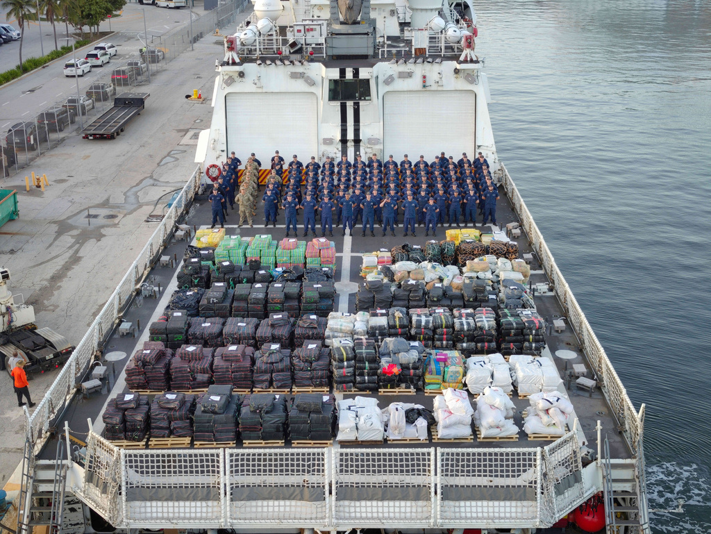 This image provided by the U.S. Coast Guard show crew members aboard the. US Coast Guard Cutter Hamilton after offloading illicit narcotics at Port Everglades, Fla., Monday, Aug. 25, 2025. (U.S. Coast Guard via AP)