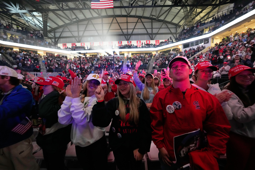 Attendees cheer during a "This Is the Turning Point" campus tour event at the University of Mississippi, in Oxford, Miss., Wednesday, Oct. 29, 2025. (AP Photo/Gerald Herbert)