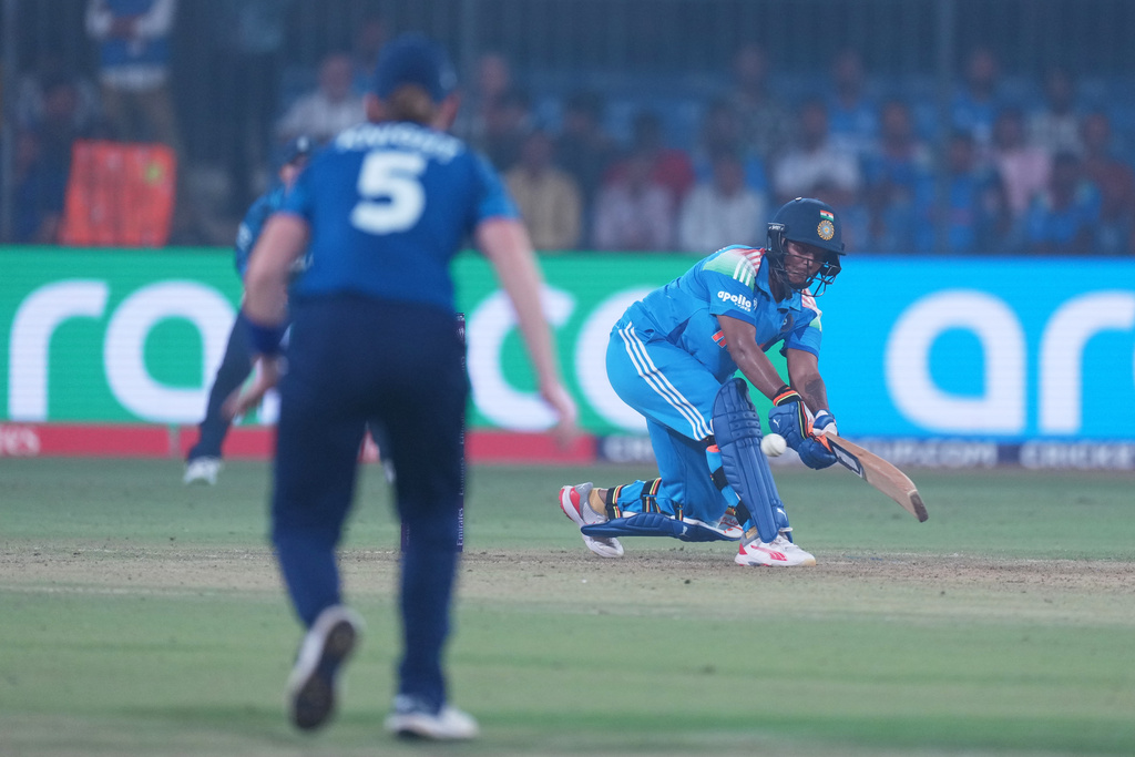 India's Deepti Sharma plays a shot during the ICC Women's Cricket World Cup match between India and England in Indore, India, Sunday, Oct. 19, 2025. (AP Photo/Ajit Solanki)