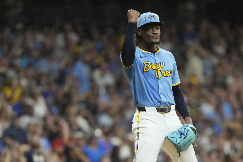 Milwaukee Brewers' Abner Uribe celebrates during the eighth inning of a baseball game against the New York Mets, Saturday, Aug. 9, 2025, in Milwaukee. (AP Photo/Aaron Gash)