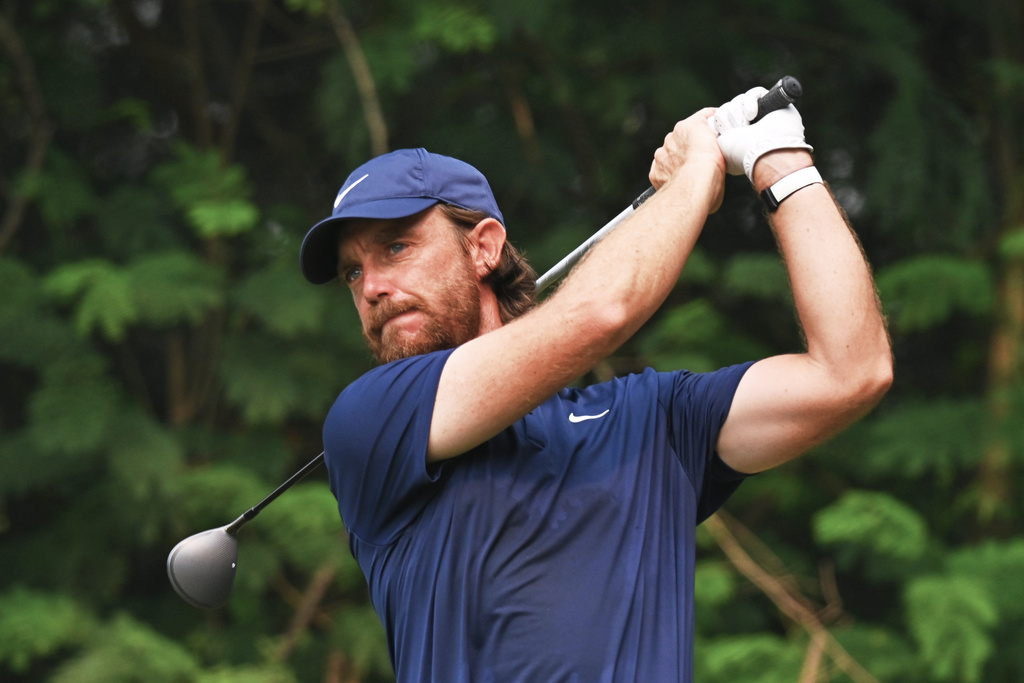 Tommy Fleetwood of England plays a shot during the DP World Tour Championship golf tournament in New Delhi, India, Sunday, Oct.19, 2025. (AP Photo/Dharam Diwakar)