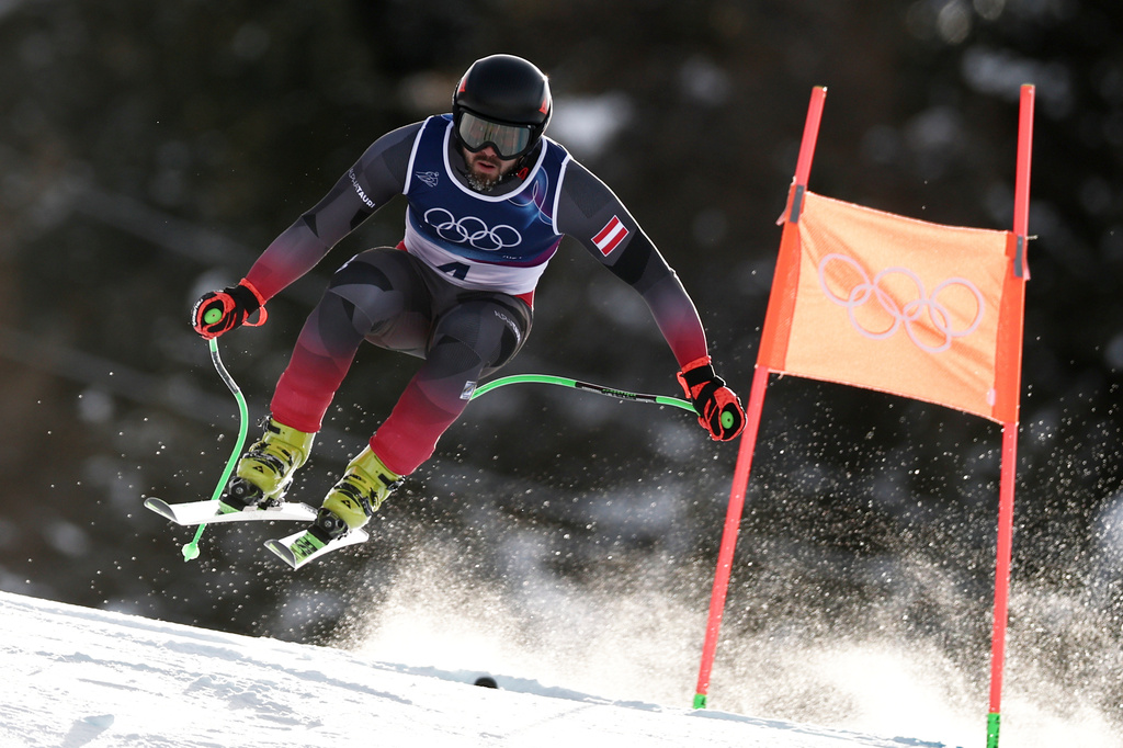 Austria's Daniel Hemetsberger speeds down the course during an alpine ski, men's downhill official training, at the 2026 Winter Olympics, in Bormio, Italy, Thursday, Feb. 5, 2026. (AP Photo/Gabriele Facciotti)
