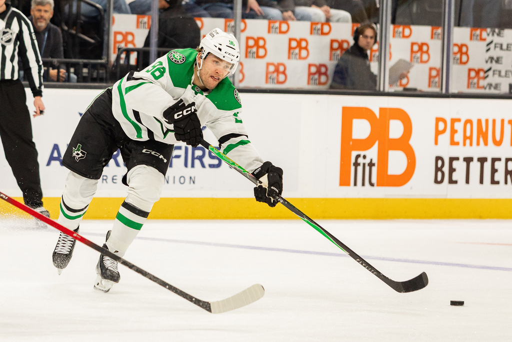 Dallas Stars right wing Mikko Rantanen (96) passes the puck against the Utah Mammoth during the second period of an NHL hockey game Saturday, Jan. 31, 2026, in Salt Lake City. (AP Photo/Melissa Majchrzak)