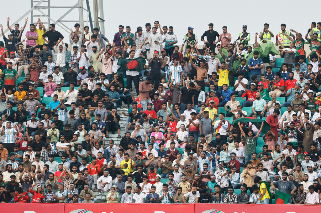 Bangladesh's fans cheer during the second T20 international cricket match between Australia and Bangladesh, in Chattogram, Bangladesh, Friday, June 19, 2026. (AP Photo/Mosaraf Hossain)