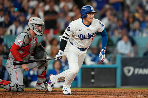Los Angeles Dodgers' Shohei Ohtani follows through on an RBI single during the sixth inning in Game 2 of the National League Wild Card baseball playoff series against the Cincinnati Reds, Wednesday, Oct. 1, 2025, in Los Angeles. (AP Photo/Mark J. Terrill) Los Angeles Dodgers' Shohei Ohtani follows through on an RBI single during the sixth inning in Game 2 of the National League Wild Card baseball playoff series against the Cincinnati Reds, Wednesday, Oct. 1, 2025, in Los Angeles. (AP Photo/Mark J. Terrill)