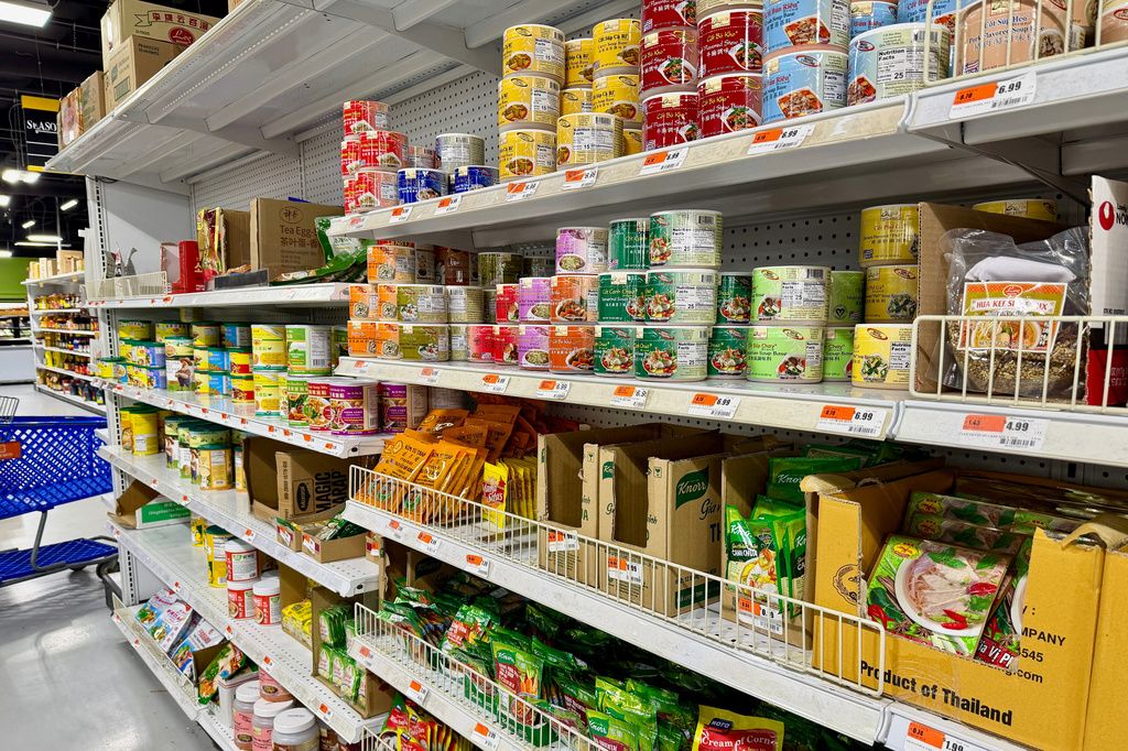 Shelves are filled with soup bases and other ingredients at Idaho Capital Asian Market in Boise, Idaho, on June 13, 2026. (AP Photo/Rebecca Boone)