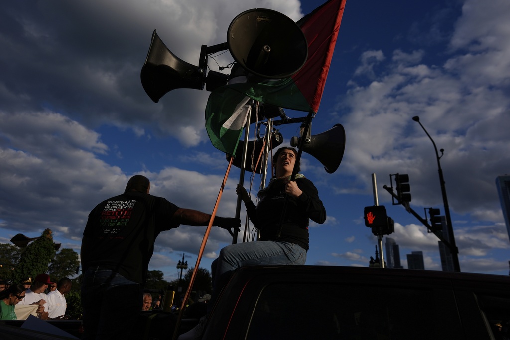People march during Illinois Coalition for Immigrant & Refugee Rights' "Chicago Says No Trump No Troops" protest Saturday, Sept. 6, 2025, in Chicago. (AP Photo/Carolyn Kaster)