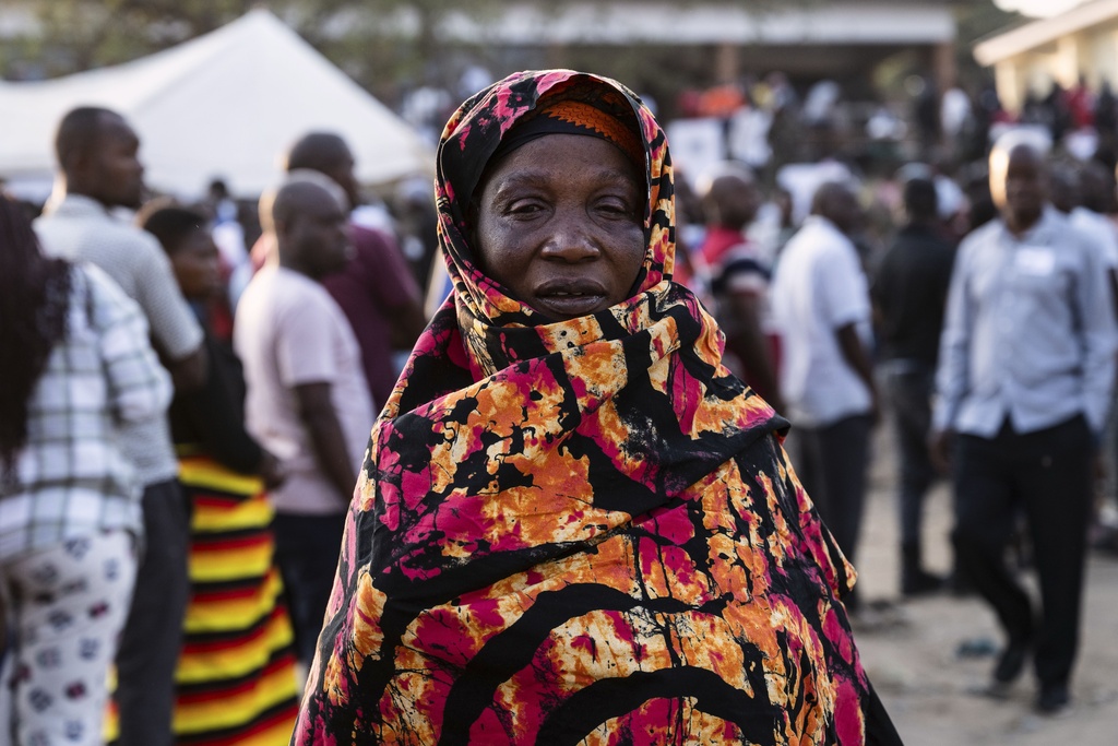 A woman lines up to cast her vote in Blantyre, Malawi, Tuesday, Sept. 16, 2025. (AP Photo/Thoko Chikondi)