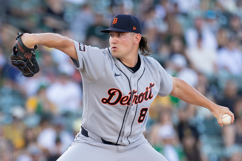 Detroit Tigers pitcher Tyler Holton throws to the Athletics during the first inning of a baseball game Friday, July 31, 2026, in West Sacramento, Calif. (AP Photo/Sara Nevis)