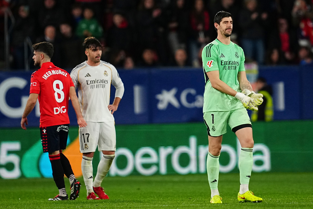 Real Madrid's goalkeeper Thibaut Courtois reacts during a Spanish La Liga soccer match between Osasuna and Real Madrid in Pamplona, Spain, Saturday, Feb. 21, 2026. (AP Photo/Miguel Oses)