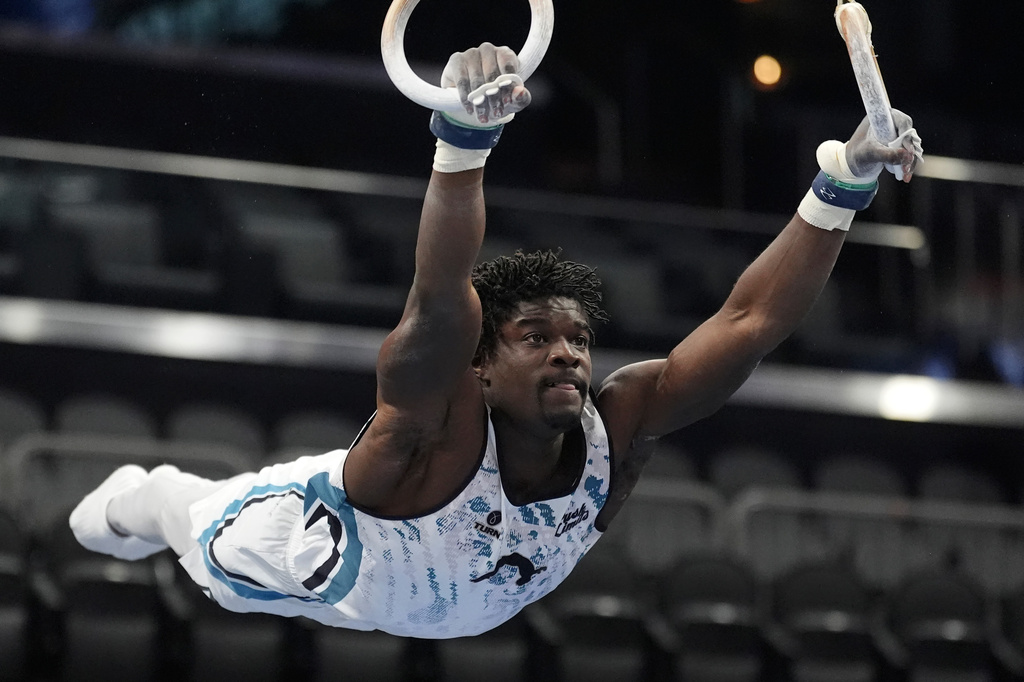 Fred Richard competes in the men's rings event during the U.S. Gymnastics Championships, Thursday, Aug. 6, 2026, in Phoenix. (AP Photo/Ross D. Franklin)