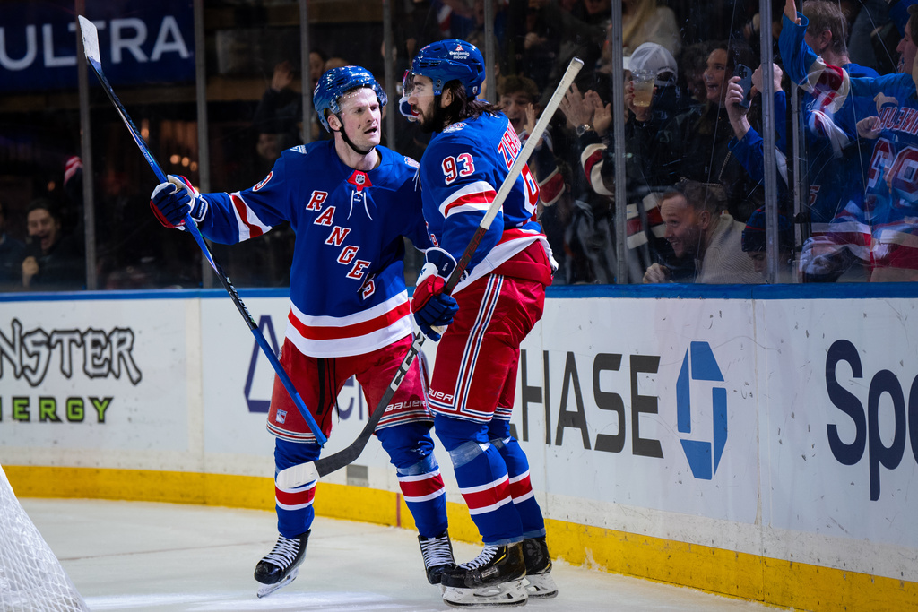 New York Rangers players celebrate a goal during the second period of an NHL hockey game against the Vegas Golden Knights, Sunday, Dec. 7, 2025, in New York. (AP Photo/Angelina Katsanis)