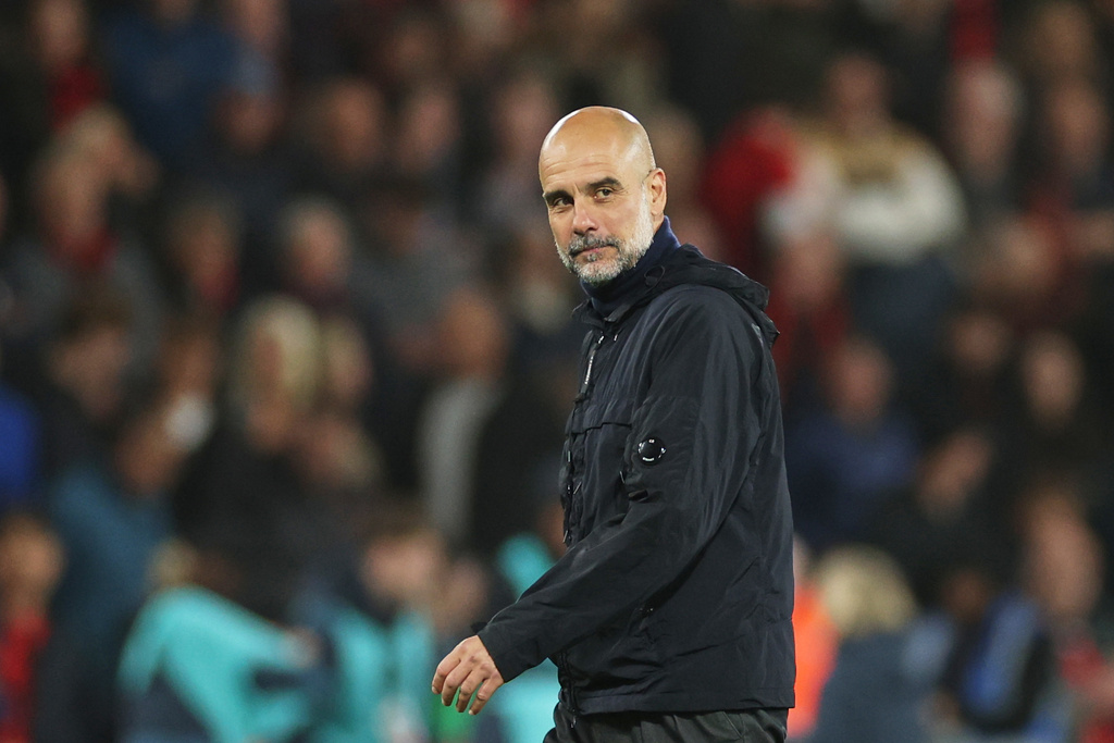 Manchester City's head coach Pep Guardiola leaves the field at the end of the English Premier League soccer match between AFC Bournemouth and Manchester City in Bournemouth, England, Tuesday, May 19, 2026. (AP Photo/Ian Walton)