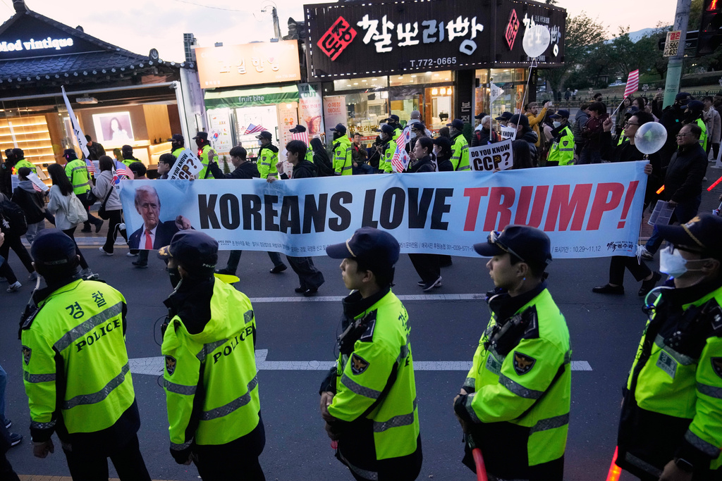 Supporters of U.S. President Donald Trump march during a rally to welcome his visit in Gyeongju, South Korea, Wednesday, Oct. 29, 2025. (AP Photo/Ahn Young-joon)