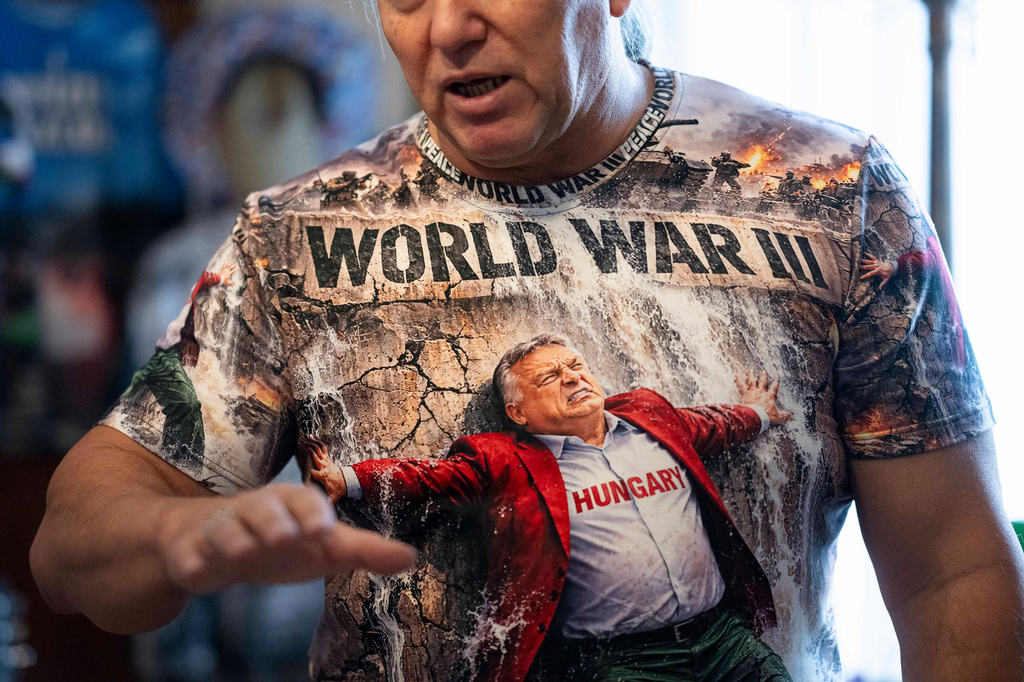 Akos Szilagyi, one of Viktor Orban's most prominent supporters, gestures during an interview in his home in Budapest, Hungary, Tuesday, April 14, 2026. (AP Photo/Denes Erdos)