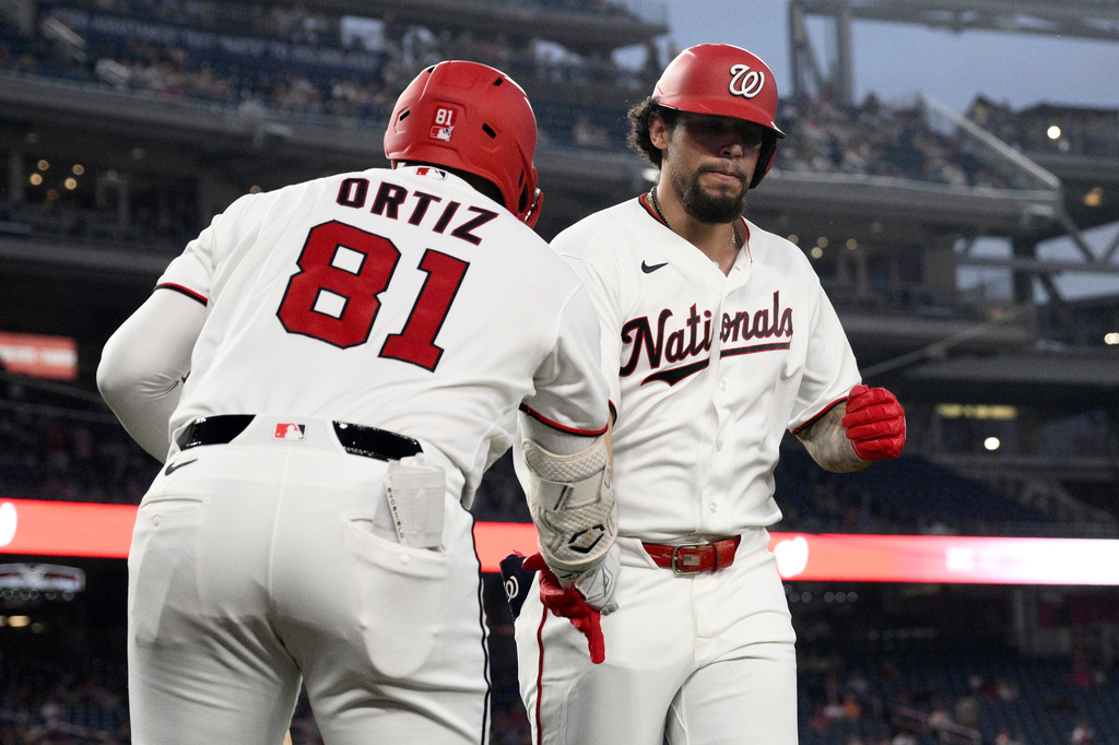 Washington Nationals' Yohandy Morales, right, celebrates his home run with Abimelec Ortiz (81) during the third inning of a baseball game against the Atlanta Braves, Tuesday, Sept. 1, 2026, in Washington. (AP Photo/Nick Wass)