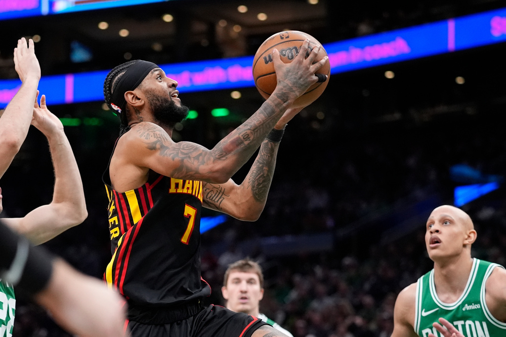 Atlanta Hawks guard Nickeil Alexander-Walker (7) goes up for a layup during the second half of an NBA basketball game against the Boston Celtics, Wednesday, Jan. 28, 2026, in Boston. (AP Photo/Robert F. Bukaty)