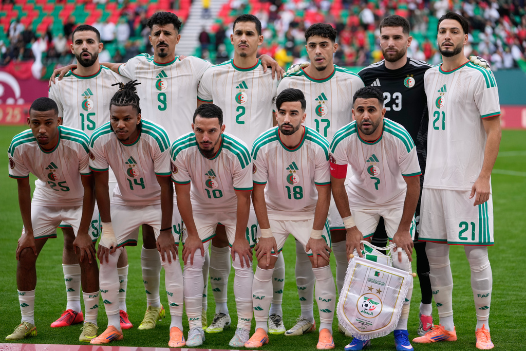 Algeria's players pose for the team picture before the Africa Cup of Nations group E soccer match between Algeria and Sudan in Rabat, Morocco, Wednesday, Dec. 24, 2025. (AP Photo/Mosa'ab Elshamy)