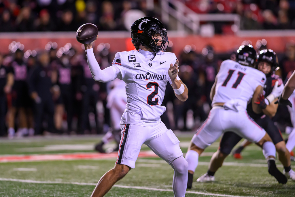 FILE - Cincinnati quarterback Brendan Sorsby (2) throws the football during the first half an NCAA college football game, Saturday against Utah, Nov. 1, 2025, in Salt Lake City, Utah. (AP Photo/Tyler Tate, File)