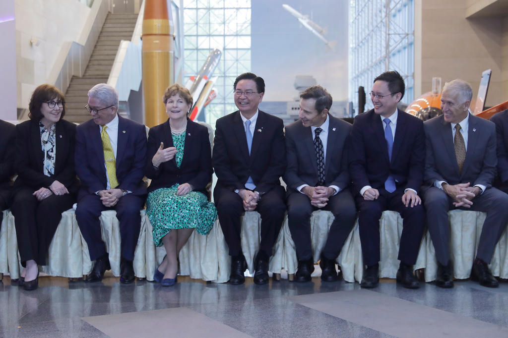 From left, US Sen. Jacky Rosen, Vice Mister of Taiwan National Defense Ministry Hsu Szu-chien, US Sen. Jeanne Shaheen, Secretary-General of the Taiwan National Security Council Joseph Wu, Sen. John Curtis, and US Sen. Thom Tillis, first from right, smile as they visiting the National Chung-Shan Institute of Science and Technology (NCSIST) in Taoyuan City, Northern Taiwan, Monday, March 30, 2026. (AP Photo/Chiang Ying-ying)