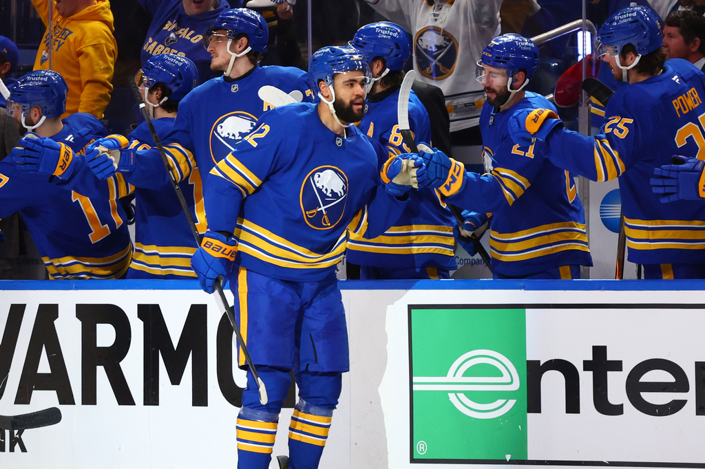 Buffalo Sabres left wing Jordan Greenway, center, celebrates his goal during the second period in Game 1 of a second-round NHL hockey Stanley Cup playoff series against the Montreal Canadiens, Wednesday, May 6, 2026, in Buffalo, N.Y. (AP Photo/Jeffrey T. Barnes)