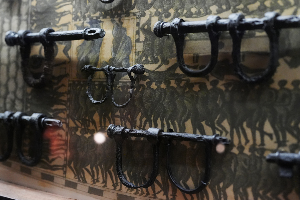 Ankle shackles, some child-sized, recovered from the wreck of the British slave ship Henrietta Marie, are displayed at the Mel Fisher Maritime Museum in Key West, Fla., Saturday, May 9, 2026. (AP Photo/Rebecca Blackwell)