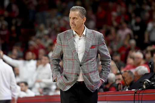 FILE - Arkansas coach John Calipari stands on the sidelines against Mississippi State during an NCAA college basketball game, March 8, 2025, in Fayetteville, Ark. (AP Photo/Michael Woods, File) FILE - Arkansas coach John Calipari stands on the sidelines against Mississippi State during an NCAA college basketball game, March 8, 2025, in Fayetteville, Ark. (AP Photo/Michael Woods, File)